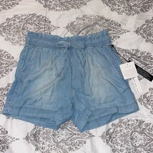 Retro 90s style light wash shorts